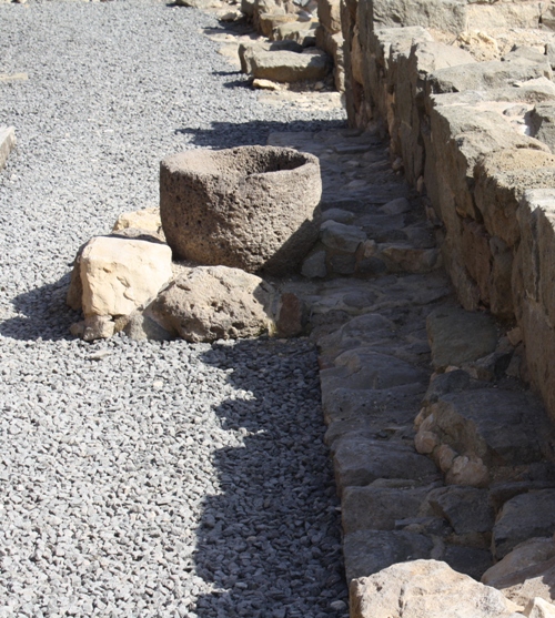 excavated stone storage vessel